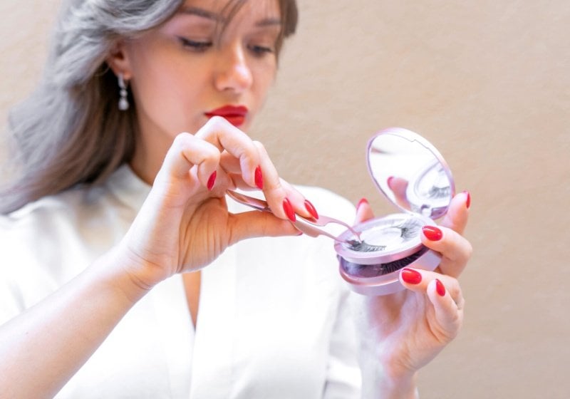 charming woman big red lips white | easiest false eyelashes to apply