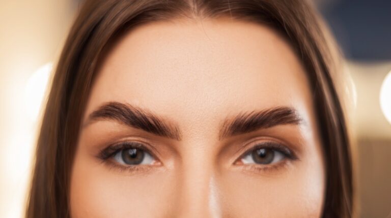 close up of laminated and stained eyebrows | Brow Lamination: Getting The Perfect Eyebrows Without The Needles | Featured