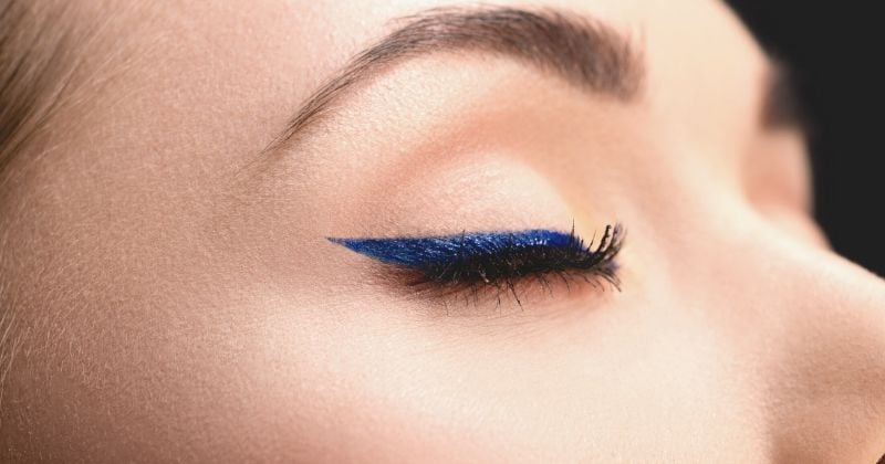 cropped view closed female eye blue | Colored Eyeliner Makeup Looks You Need To Try | how to wear color eyeliner
