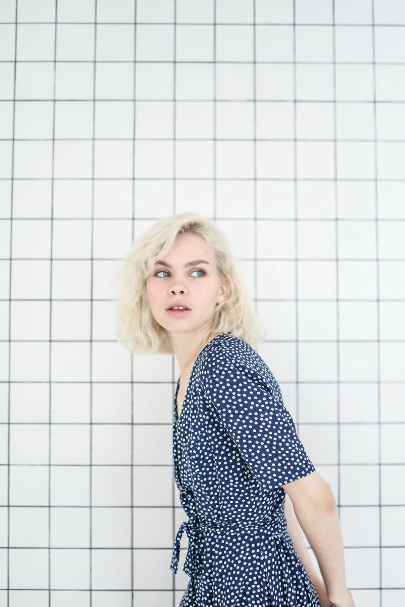 photo-of-girl-in-blue-dress-standing | How To Grow Out Natural Hair Color Seamlessly