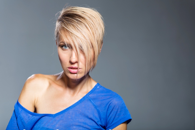 young woman short trendy haircut over | undercut fade
